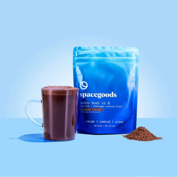 Astro Dust chocolate powder pouch beside calming evening mug.